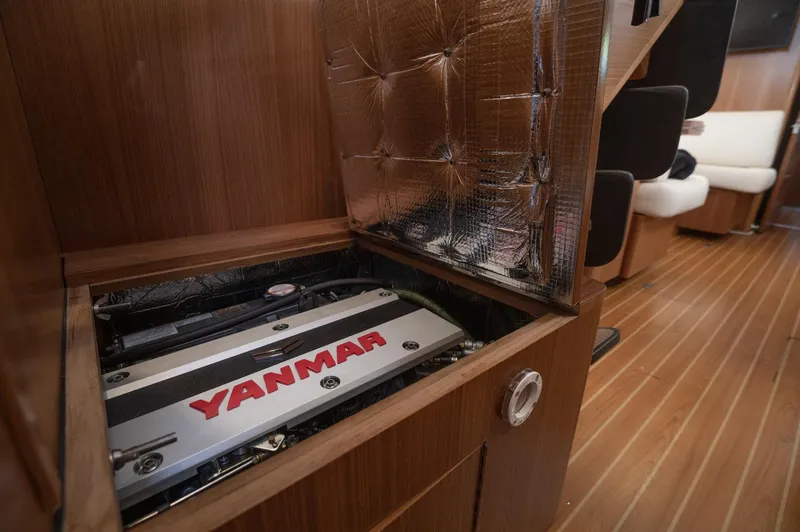 Slide: The Image of Engine compartment of 2024 Catalina 445 sailboat with Yanmar engine, wooden interior. - 20