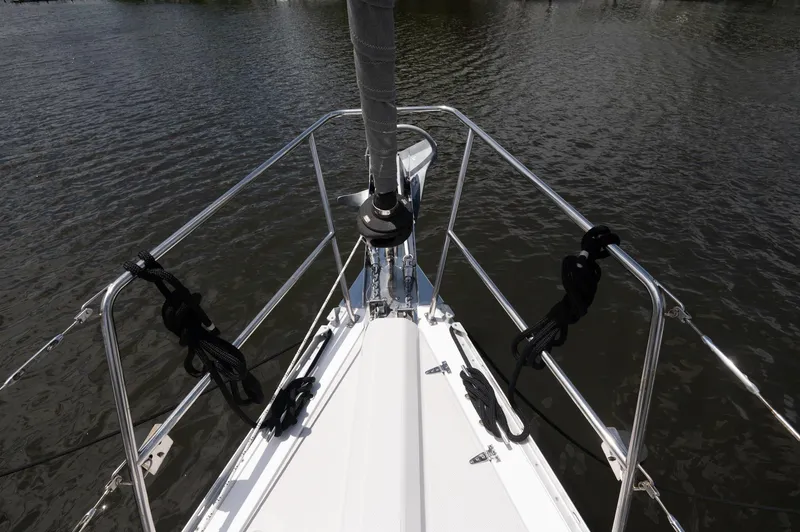 Slide: The Image of Bow view of 2024 Catalina 445 sailboat on calm water. - 27