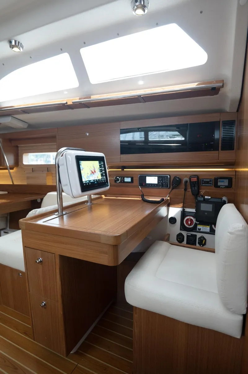 Slide: The Image of 2024 Catalina 445 yacht interior with navigation station and modern equipment. - 4