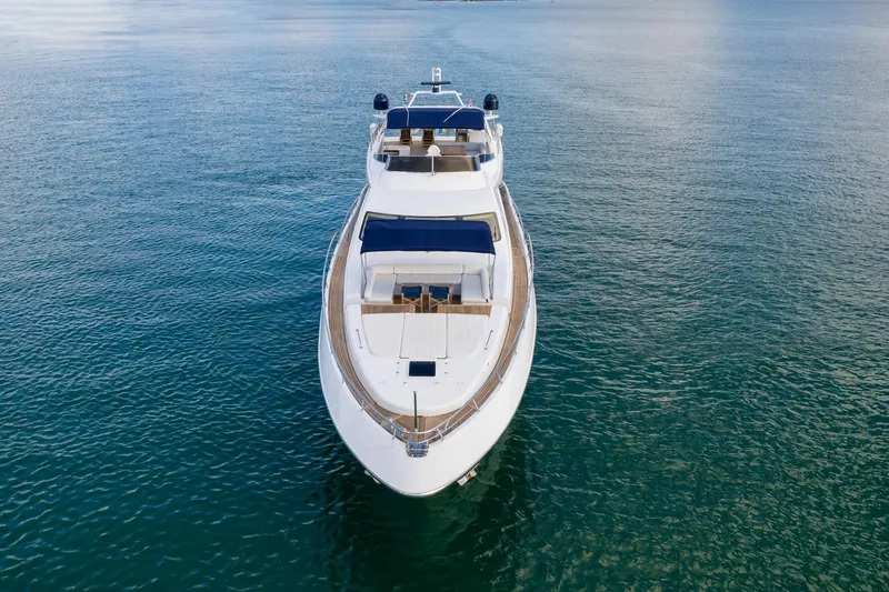 Slide: The Image of Azimut 98 Leonardo 2006 yacht on calm blue water, aerial front view. - 11