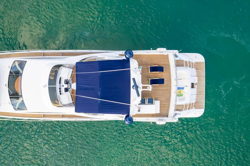 Slide: The Image of Overhead view of 2006 Azimut 98 Leonardo yacht on clear water. - 14