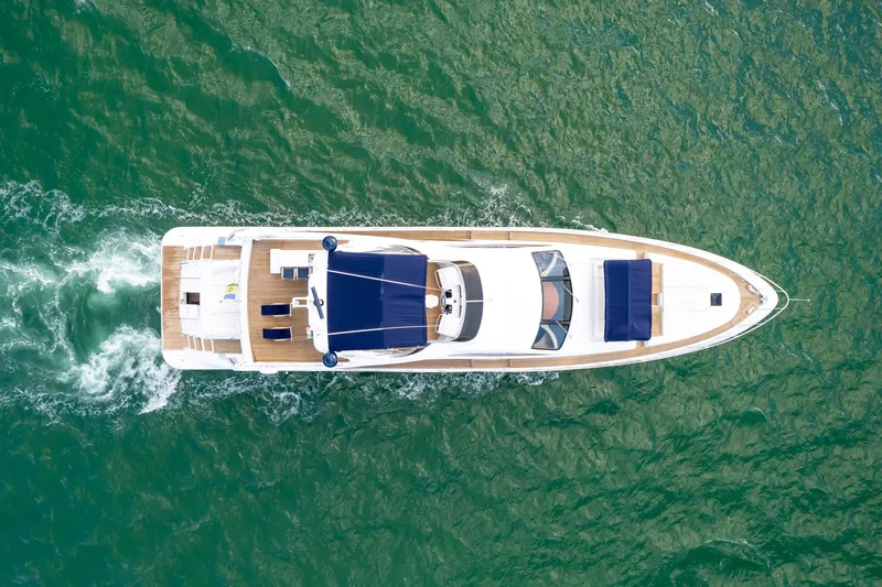 Slide: The Image of Aerial view of 2006 Azimut 98 Leonardo yacht cruising on green water. - 20