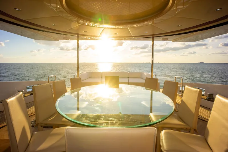 Slide: The Image of Luxurious Azimut 98 Leonardo yacht dining area with ocean sunset view, 2006 model. - 28