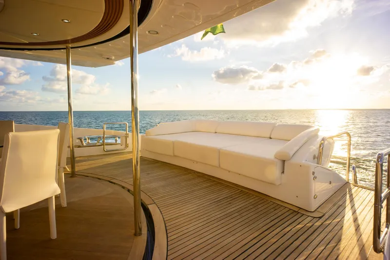 Slide: The Image of Luxurious 2006 Azimut 98 Leonardo yacht deck with ocean view at sunset. - 31
