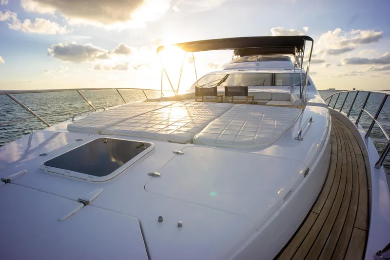 Slide: The Image of Luxurious 2006 Azimut 98 Leonardo yacht at sunset on the open sea. - 36