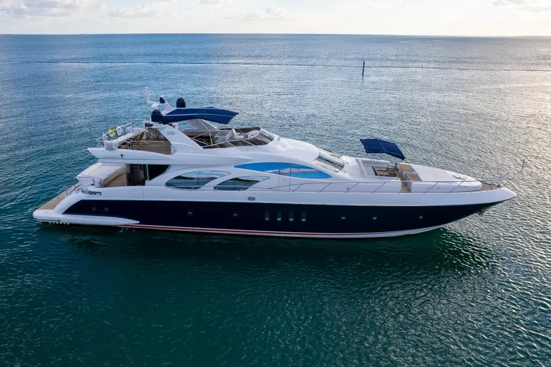 Slide: The Image of Luxury 2006 Azimut 98 Leonardo yacht cruising on calm ocean waters. - 4