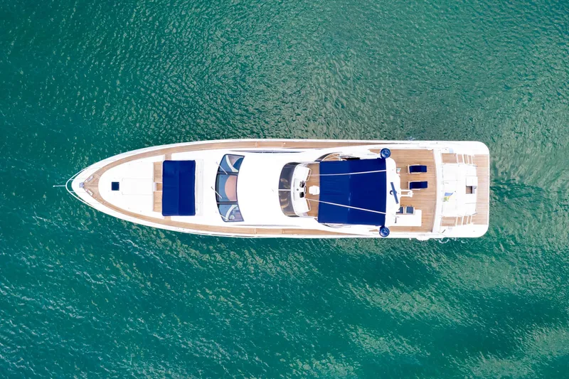 Slide: The Image of Aerial view of 2006 Azimut 98 Leonardo yacht on turquoise water. - 7