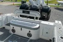 Slide: The Image of 2007 Fountain 38 Tournament Edition boat with dual engines, parked outdoors. - 11