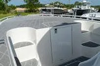 Slide: The Image of 2007 Fountain 38 Tournament Edition boat deck with storage compartments. - 14