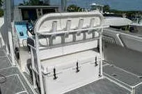 Slide: The Image of 2007 Fountain 38 Tournament Edition boat interior with seating and storage. - 17