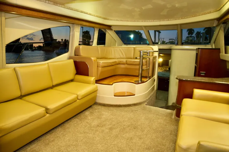 Slide: The Image of Luxurious interior of a 2006 Sea Ray 44 Sedan Bridge yacht with plush seating. - 15
