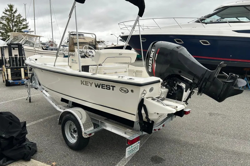 Slide: The Image of 2014 Key West 1720 Center Console boat on trailer with Suzuki outboard motor. - 3