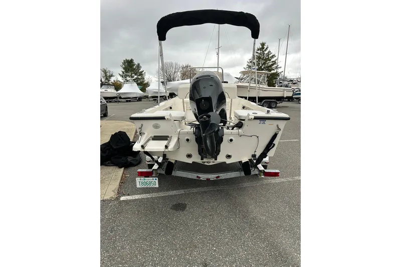 Slide: The Image of 2014 Key West 1720 Center Console boat on trailer in parking lot. - 4