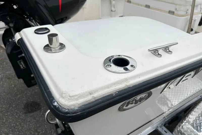 Slide: The Image of 2014 Key West 1720 Center Console boat stern with rod holder and cleat. - 5