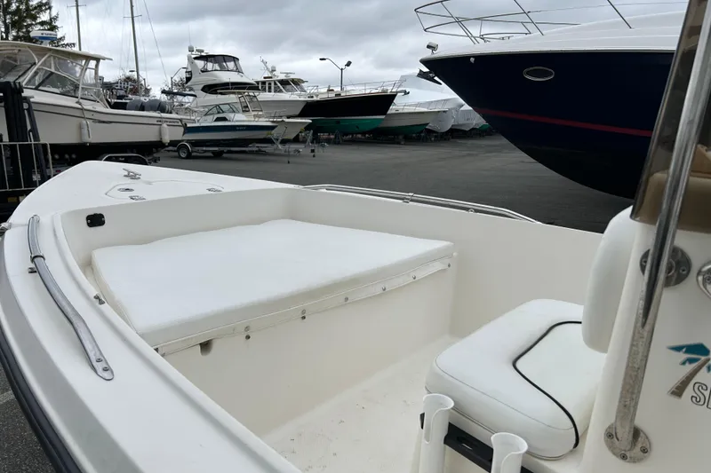 Slide: The Image of 2014 Key West 1720 Center Console boat in marina with other vessels. - 7