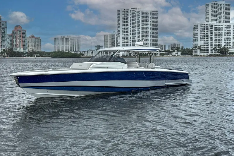 Slide: The Image of 2024 Opus OPUS 12 boat on water with city skyline background. - 4