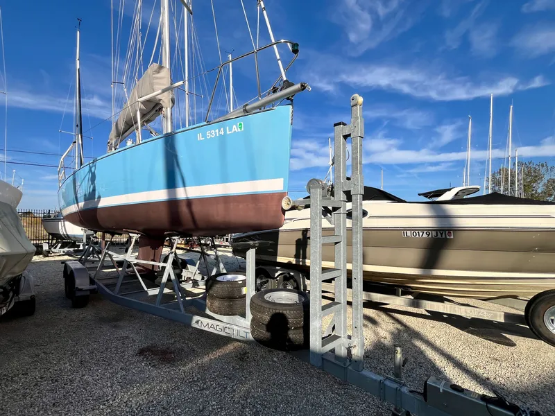 Slide: The Image of 2021 Catalina 275 Sport sailboat on a trailer at the marina. - 20