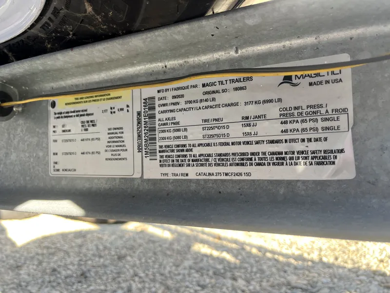 Slide: The Image of Label on a Magic Tilt Trailer, Catalina 275 Sport model, year 2021. - 29