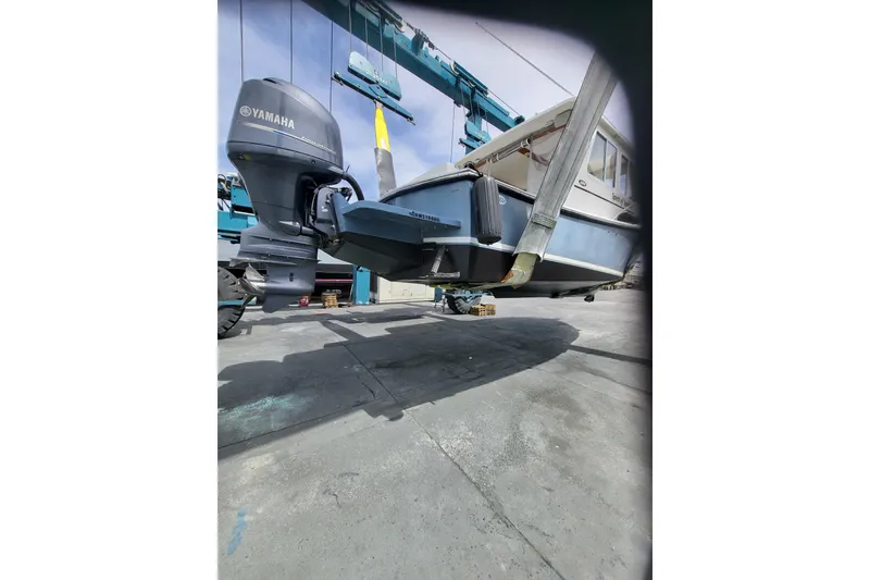 Slide: The Image of 2015 Eastern Islander 270 boat with Yamaha outboard motor in a shipyard. - 8