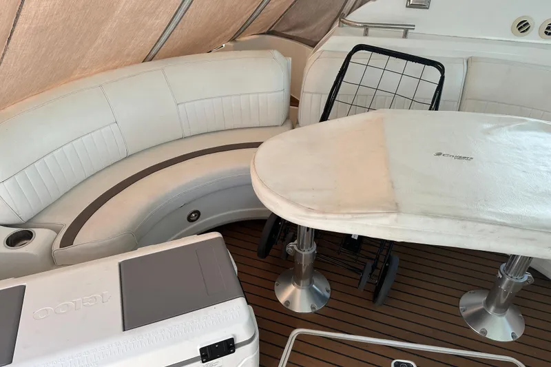 Slide: The Image of 2011 Cruisers Yachts 540 Sports Coupe interior with seating and table. - 20