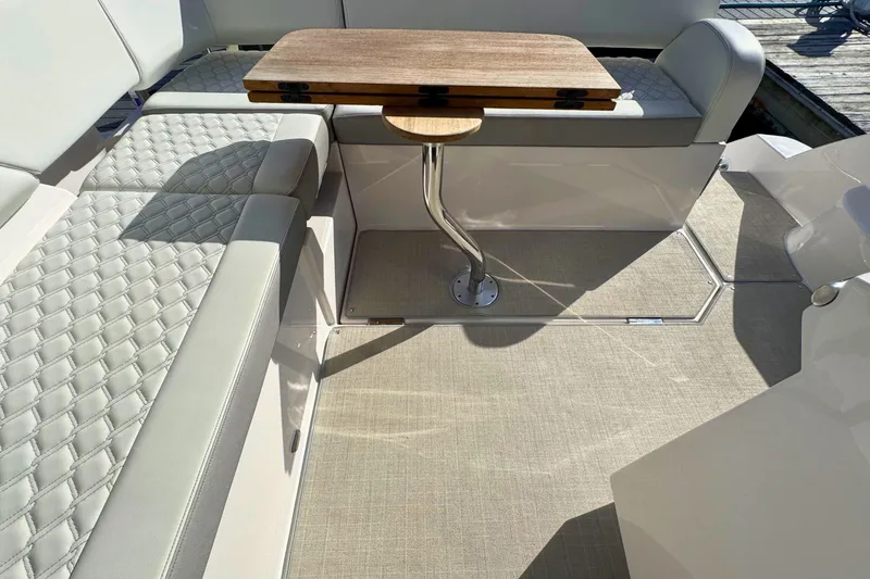 Slide: The Image of 2021 Regal 38 Grande Coupe displayed on a screen inside a boat. - 13