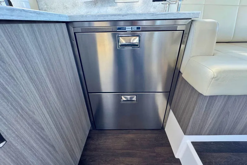 Slide: The Image of Stainless steel drawer in 2021 Regal 38 Grande Coupe yacht interior. - 21