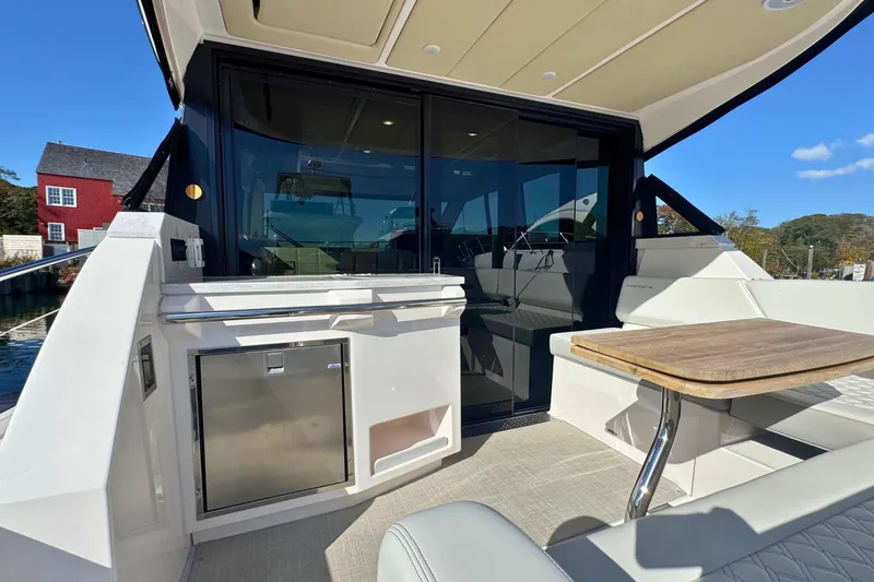 Slide: The Image of 2021 Regal 38 Grande Coupe interior with sleek seating and modern design. - 6