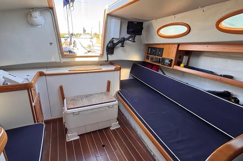 Slide: The Image of Interior of 2016 Alerion Express 28 sailboat with seating and navigation equipment. - 25
