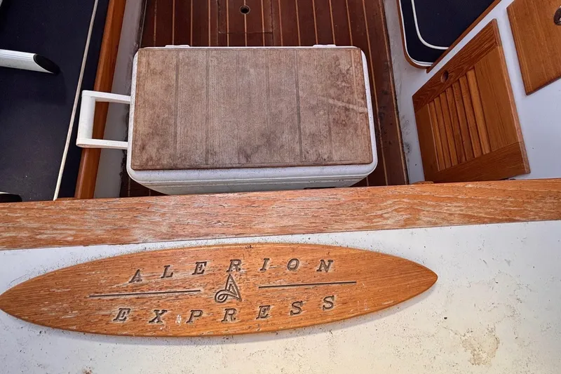 Slide: The Image of Interior of 2016 Alerion Express 28 sailboat with wooden accents and storage. - 27