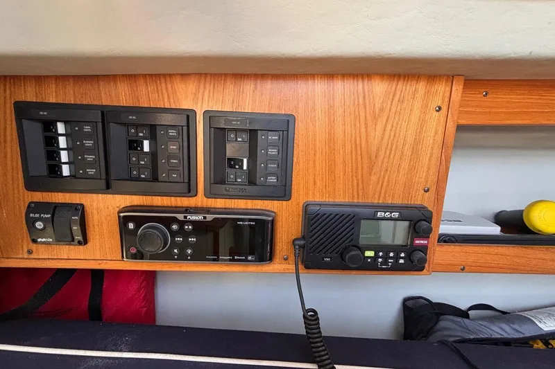 Slide: The Image of Control panel of a 2016 Alerion Express 28 sailboat with navigation and audio systems. - 31