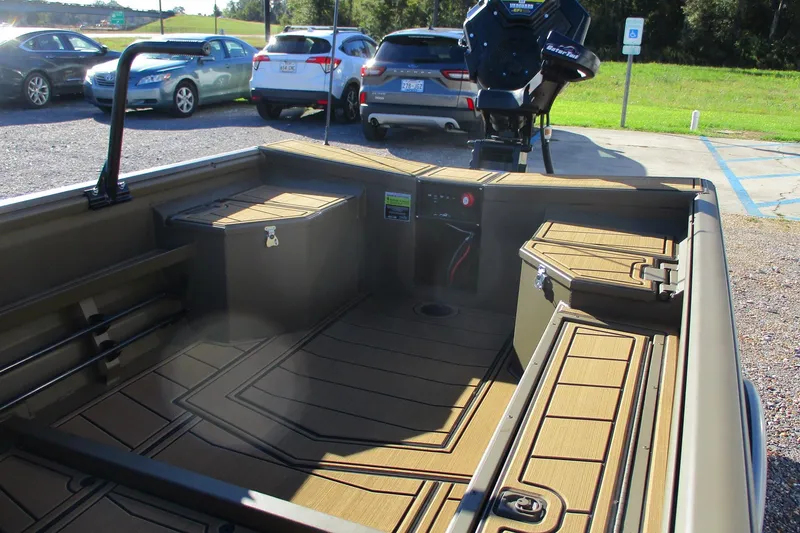 Slide: The Image of 2026 Gator Tail 1750 Savage Mid Deck boat interior with storage compartments. - 13