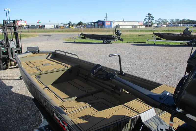 Slide: The Image of 2026 Gator Tail 1750 Savage Mid Deck boat in outdoor setting, showcasing interior layout. - 4