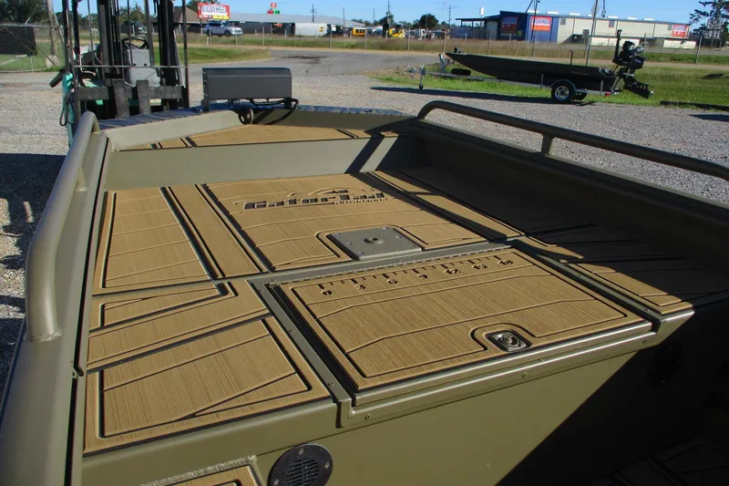 Slide: The Image of 2026 Gator Tail 1750 Savage Mid Deck boat with sleek design and spacious deck. - 8