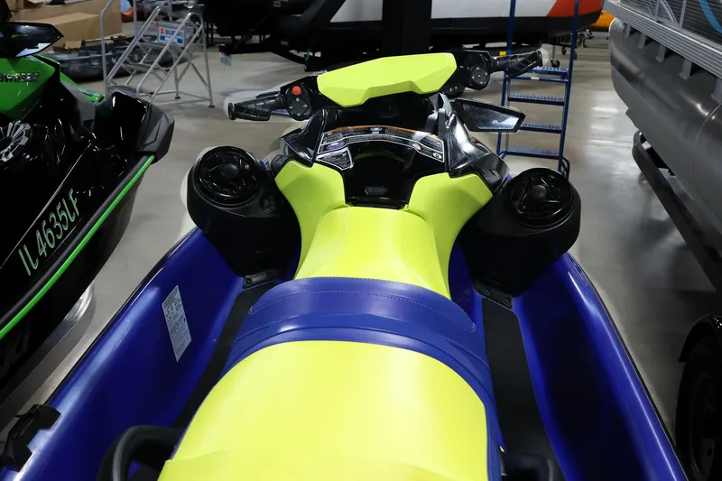 Slide: The Image of 2020 Sea Doo 170 jet ski with vibrant yellow and blue seat design. - 4