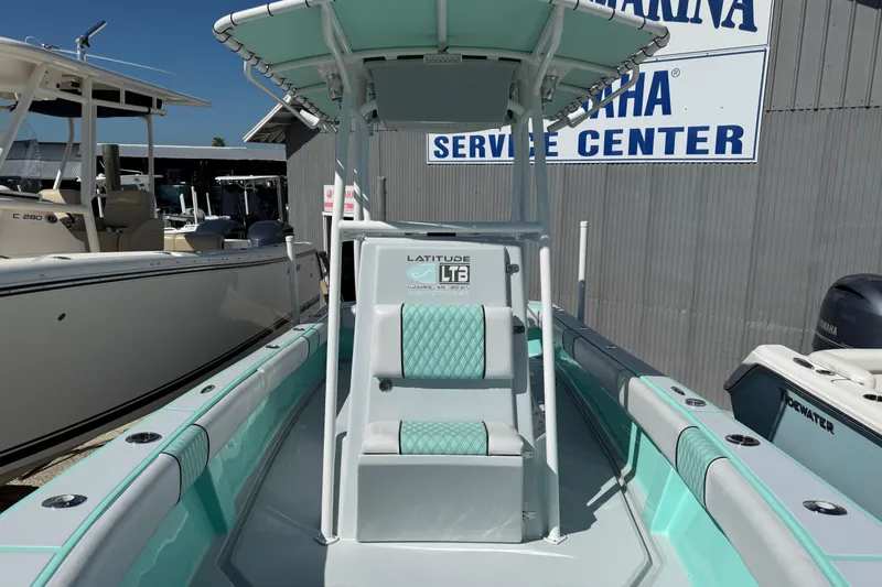 Slide: The Image of 2018 Latitude Tournament Boats Competitor 25 at marina service center. - 12