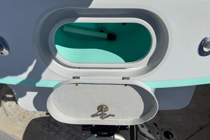 Slide: The Image of Open storage compartment on 2018 Latitude Tournament Boats Competitor 25. - 19