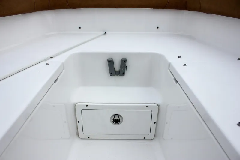 Slide: The Image of Interior view of 2020 Sea Hunt Ultra 275 SE boat, featuring storage compartment. - 12
