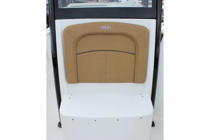 Slide: The Image of 2020 Sea Hunt Ultra 275 SE boat seat with tan cushion and black trim. - 13