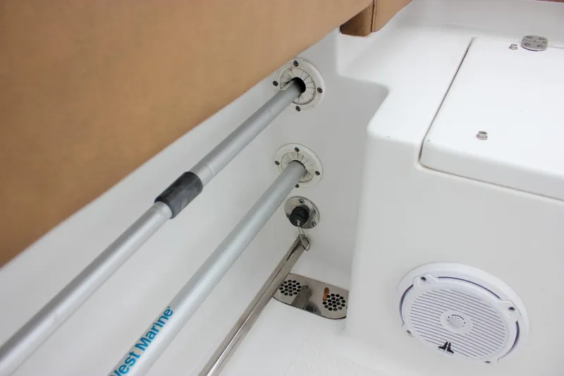 Slide: The Image of Interior view of 2020 Sea Hunt Ultra 275 SE boat, featuring rod holders and speaker. - 49