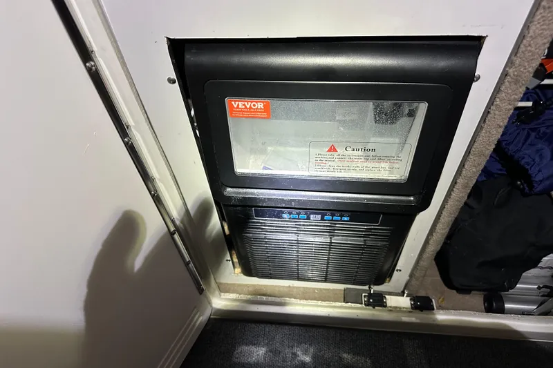 Slide: The Image of Built-in Vevor ice maker on 1997 Sea Ray 400 Sundancer yacht. - 27