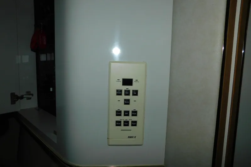 Slide: The Image of Control panel on 1997 Sea Ray 400 Sundancer yacht interior wall. - 34