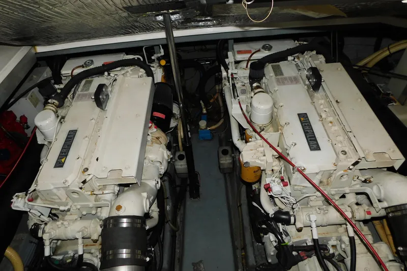 Slide: The Image of Engine room of a 1997 Sea Ray 400 Sundancer with twin Caterpillar engines. - 81