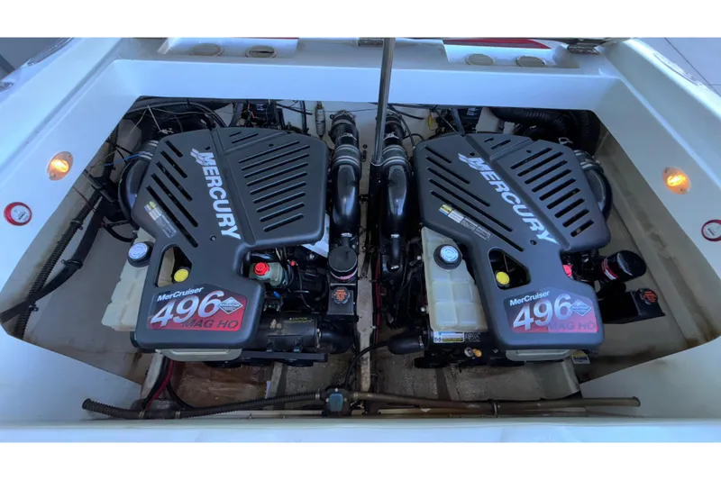 Slide: The Image of Twin Mercury MerCruiser 496 MAG HO engines in a 2001 Baja 33 Outlaw boat. - 10