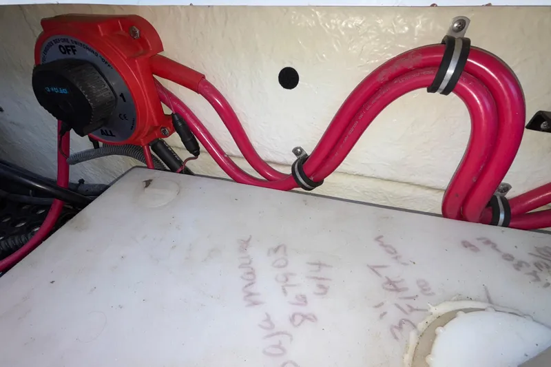 Slide: The Image of Battery switch and wiring inside a 2001 Baja 33 Outlaw boat. - 8