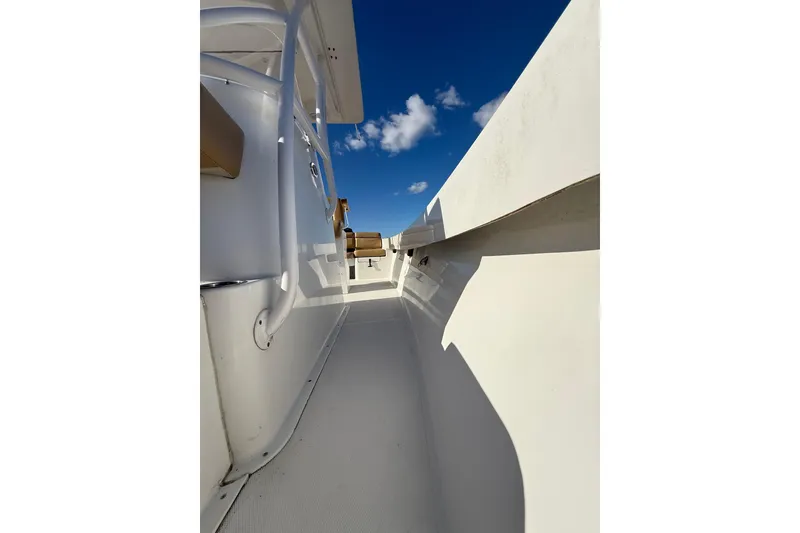 Slide: The Image of 2020 Bristol Harbor Vanquish boat deck with clear blue sky background. - 12