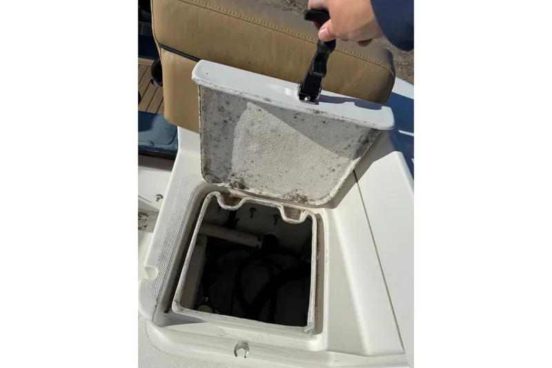 Slide: The Image of Open storage compartment on 2020 Bristol Harbor Vanquish boat. - 20