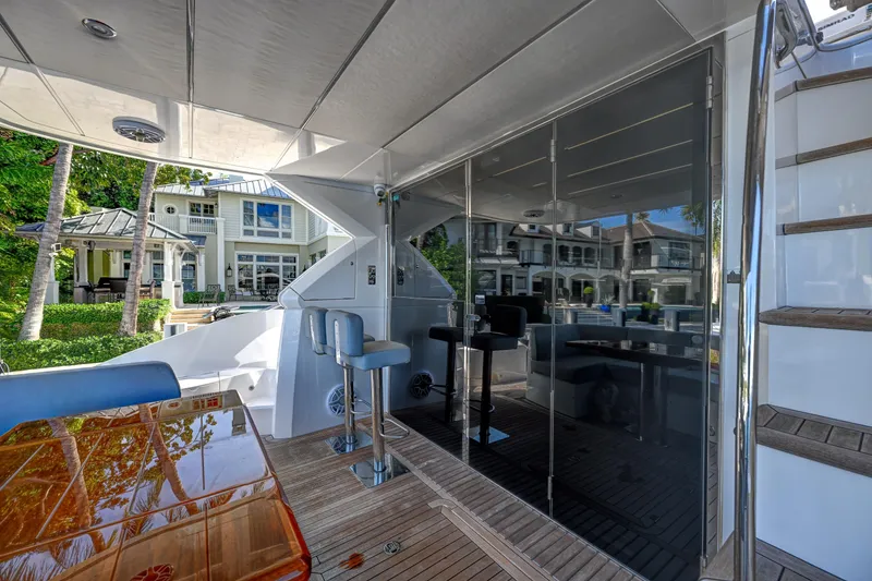 Slide: The Image of Luxurious 2020 Sunseeker Manhattan 52 yacht interior with modern seating and elegant design. - 14