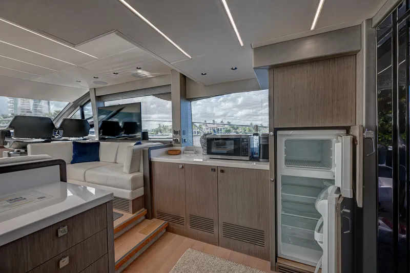 Slide: The Image of Luxurious interior of 2020 Sunseeker Manhattan 52 yacht with modern kitchen amenities. - 20