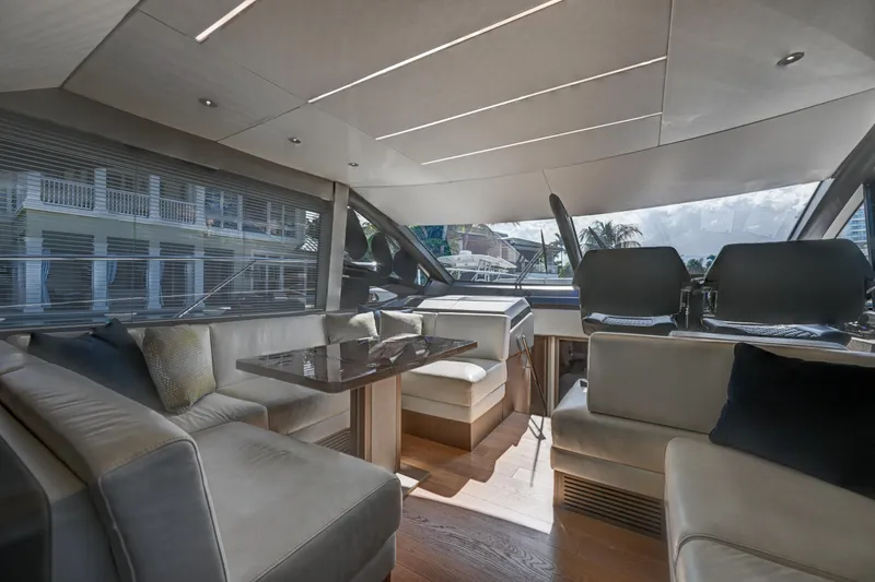 Slide: The Image of Luxurious interior of 2020 Sunseeker Manhattan 52 yacht with elegant seating and dining area. - 22