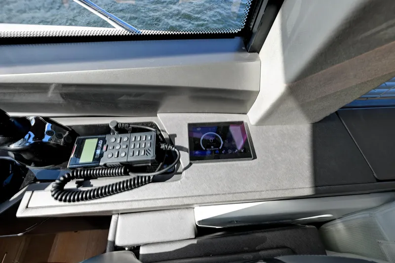 Slide: The Image of Control panel of a 2020 Sunseeker Manhattan 52 yacht with communication device. - 26